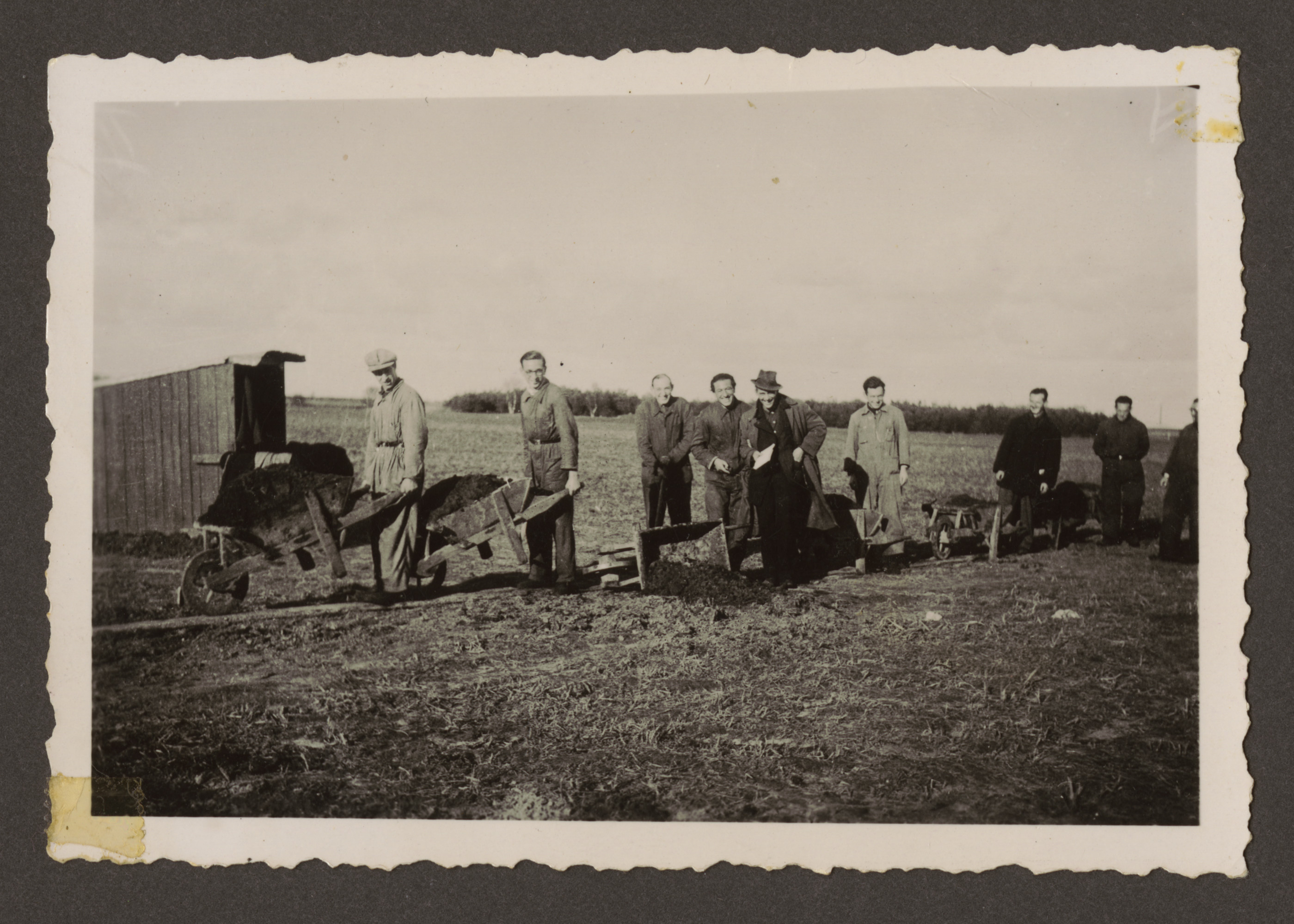 Men on a work brigade building the Westerbork transit camp.

Pictured at the far left holding a wheelbarrow  is Erich Rosendahl.
