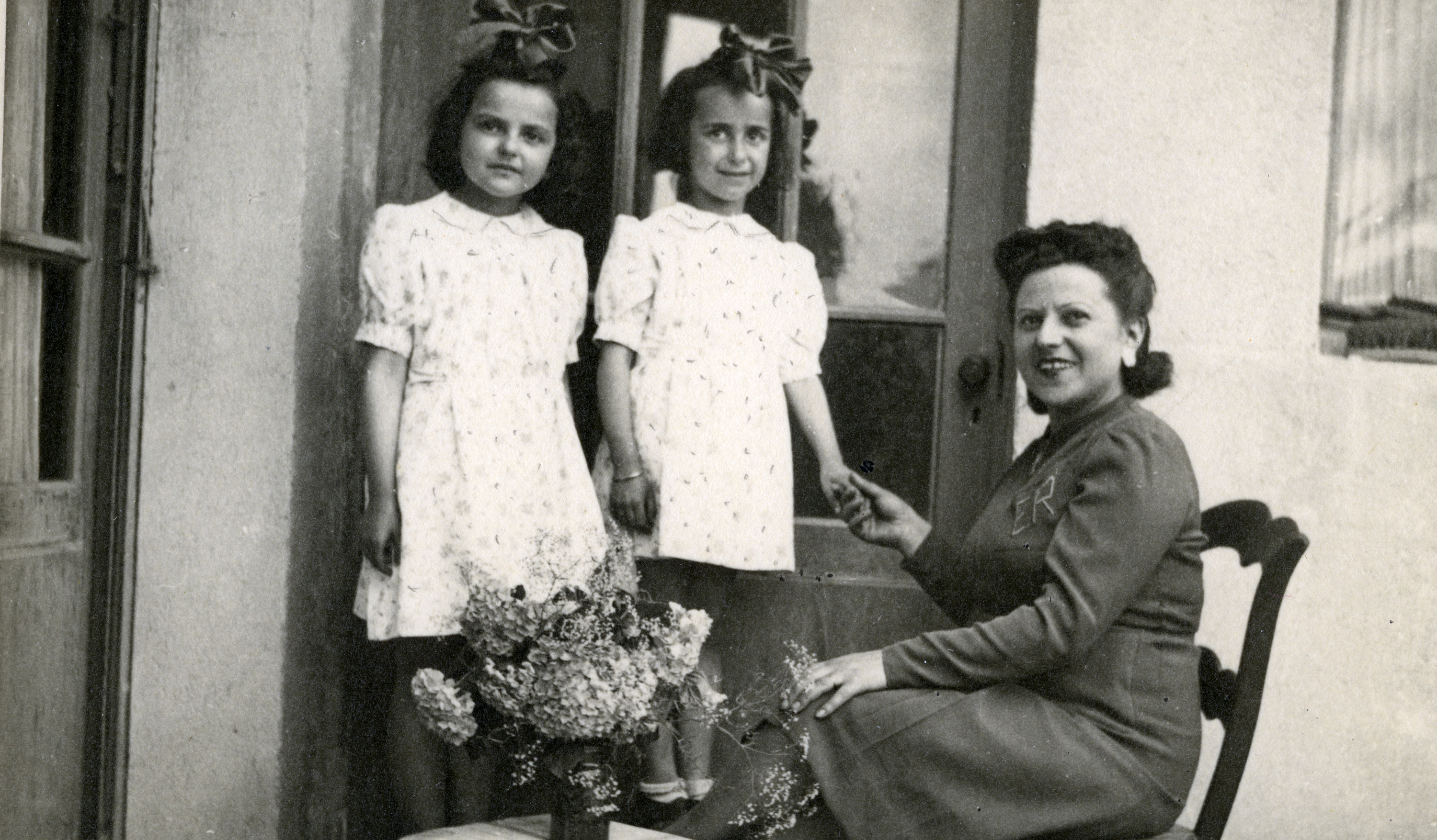 Claire Ridnik, her mother Etla and cousin Aliette pose in their apartment towards the end of the war.
