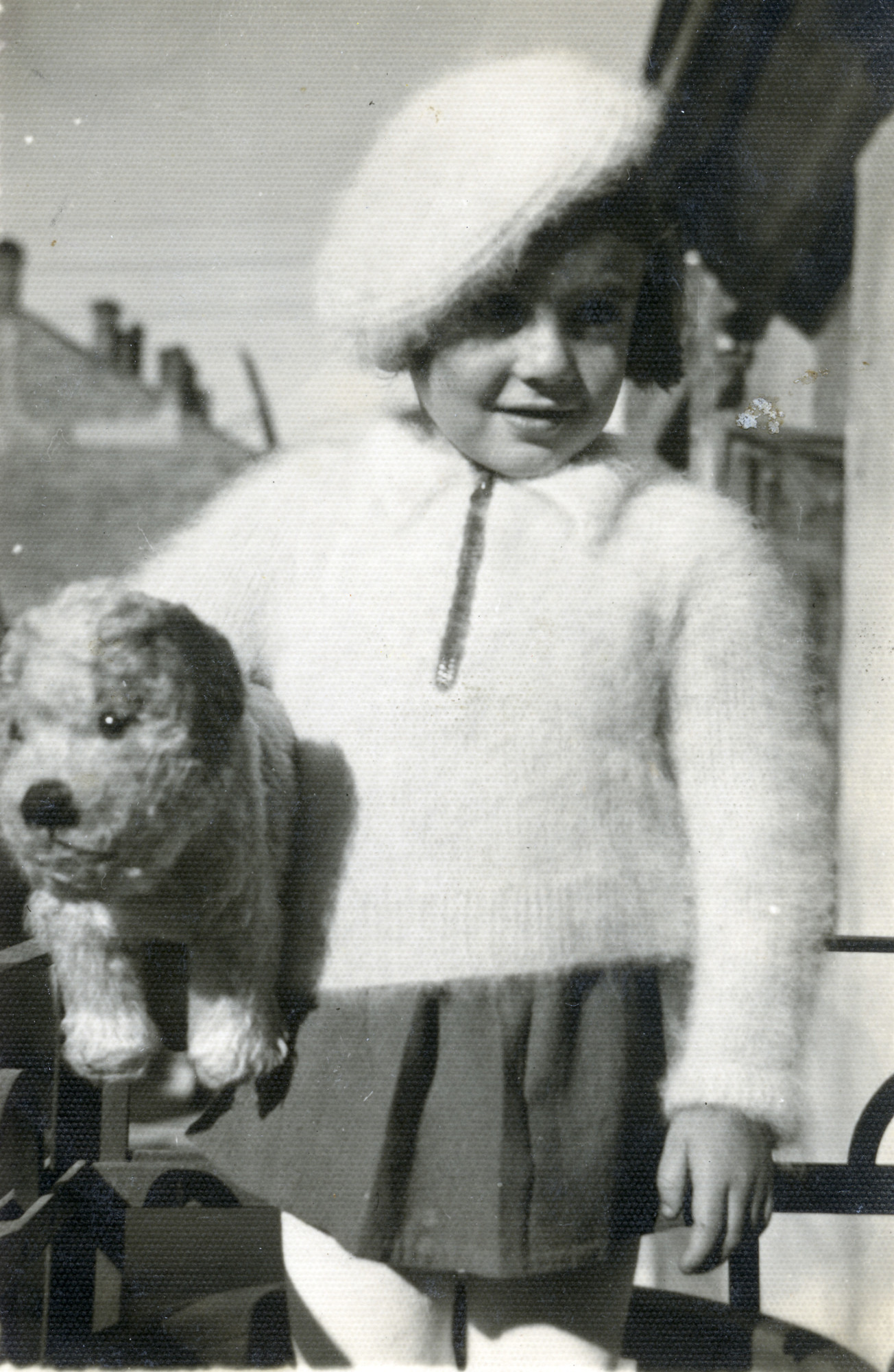 Leah Alterman poses, holding her stuffed animal prior to going into hiding.