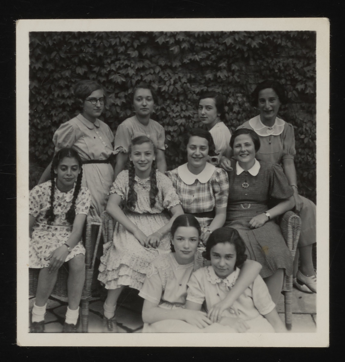 Girls from the Lenore Goldschmidt School celebrate the birthday of [first name unidentified] Schlesinger.

Among those pictured is Gertrud Goldschmidt (donor), second row, second from the left.  Also pictured on the top row is Hannelore Philipsohn who escaped to Sweden.