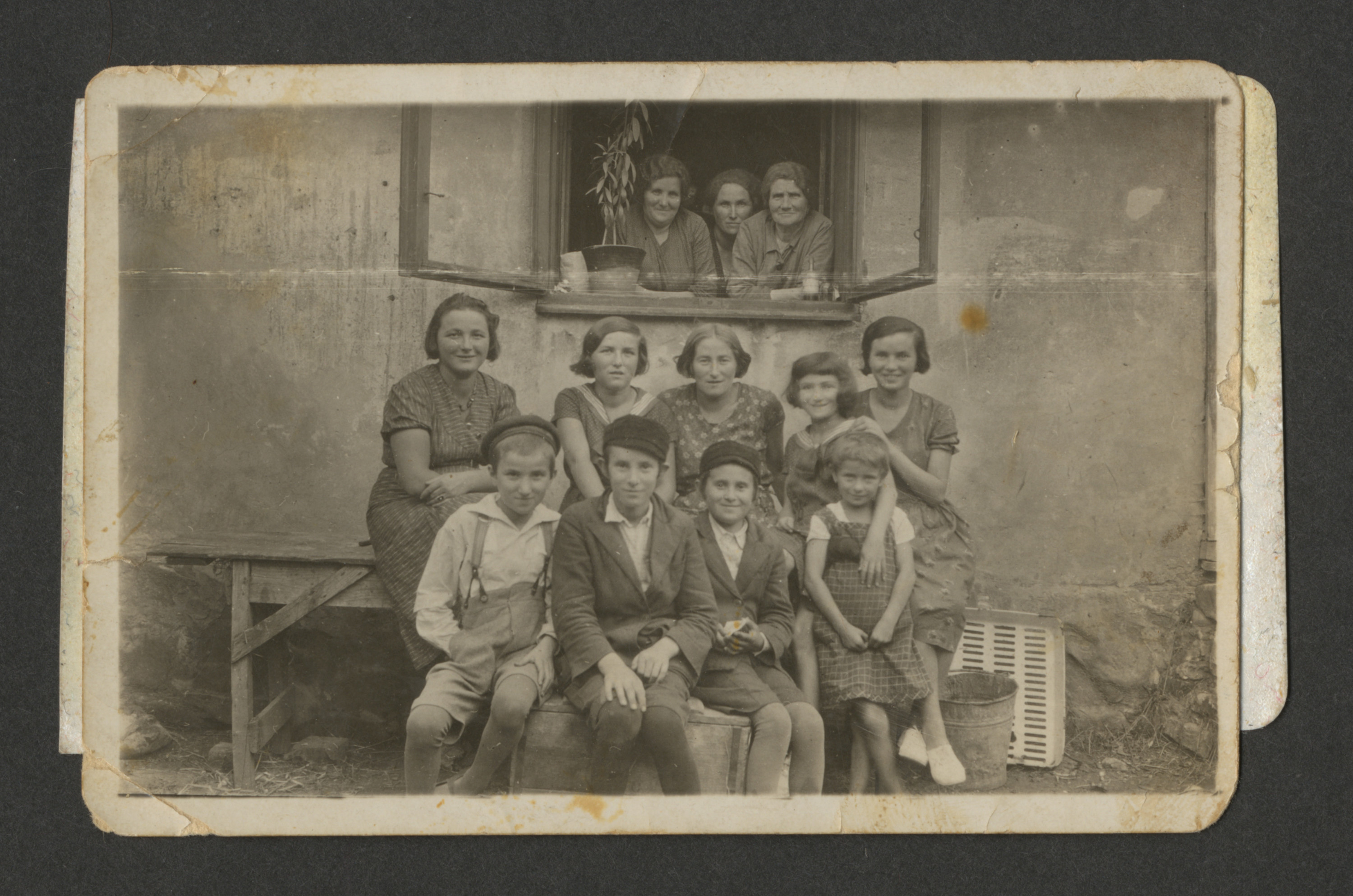 A Polish Jewish family gathers for a photograph.

Among those pictured are (front row, left to right) Yoel Ullman and brothers Moshe and Mayer Spiro.  Blima Spiro is pictured seated in back, far right.