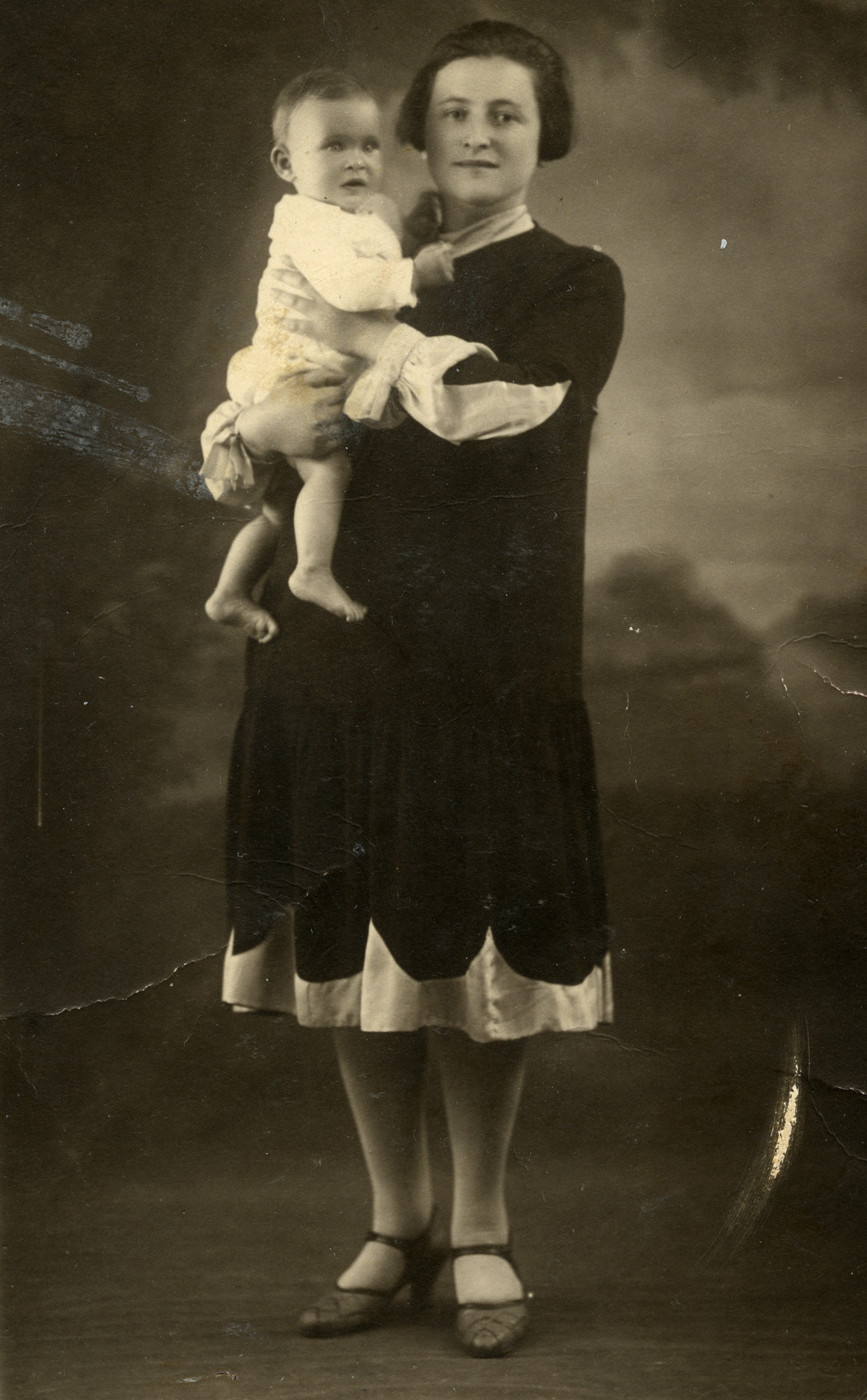 Raya Dimenstein holding her baby, Sophie.

Raya, her husband, and Sophie were deported and are presumed to have perished.