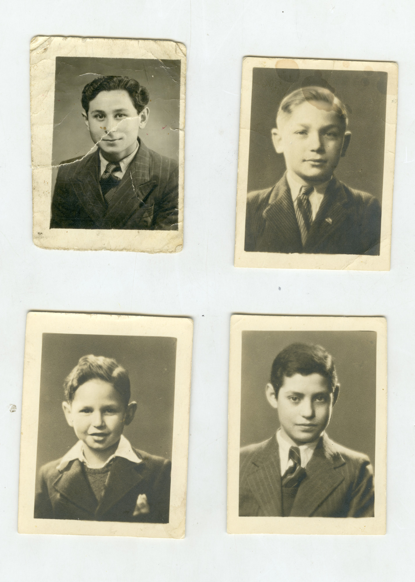Portraits of children who lived in Home de la Bas in Belgium.

Pictured clockwise from the upper left are Edmund Mell, Ignas Sabot, Joseph Flaks, and Otto Druckman.