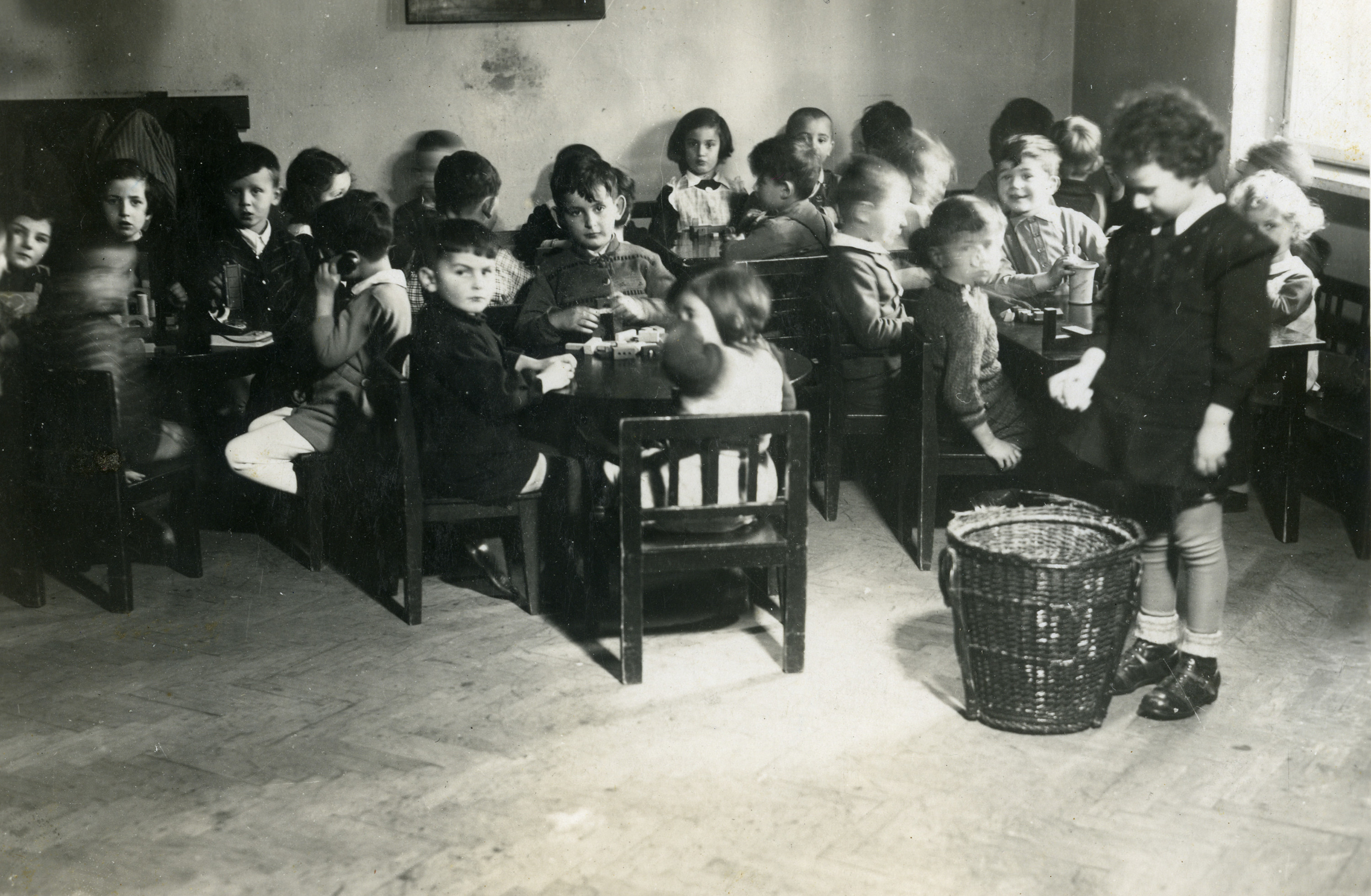 Kindergarten children sit at their desks at a school in Zilina.

Among those pictured is Itzhak Platzner (third from the left).