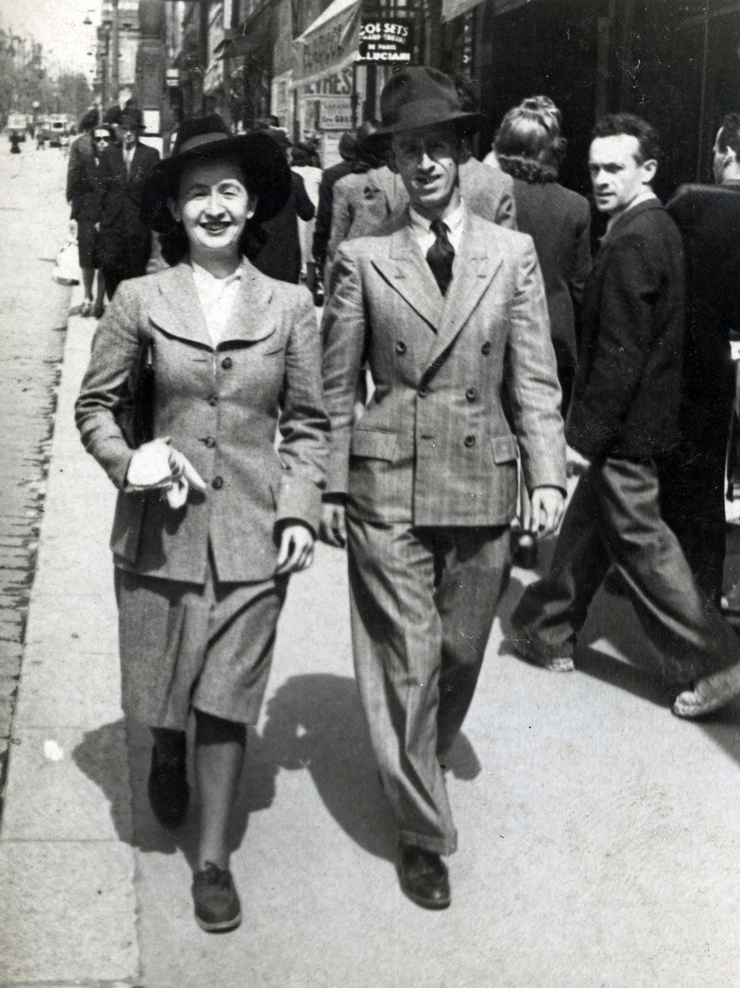 Siblings Malka Hercberg and Maurice Tannenbaum walk down the street of Marseilles.