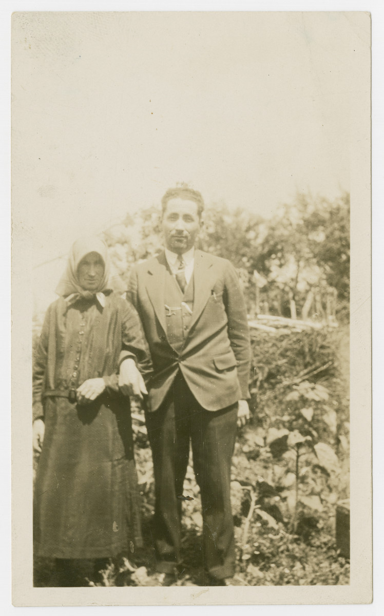 Jack Isaac stands for a portrait with his mother.