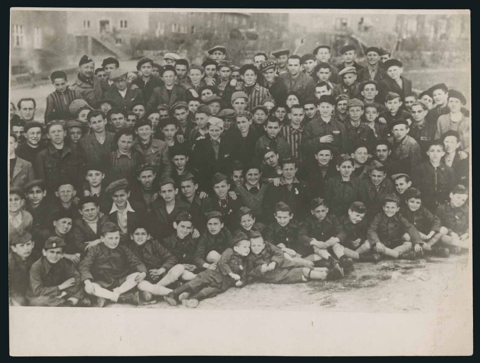 Group portrait of the Buchenwald Boys before they left for France and Switzerland.

American Army chaplain, Rabbi Robert Marcus is pictured on the top left.