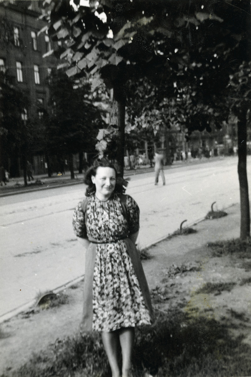 Franka poses on a street in Warsaw while hiding on the Aryan side.