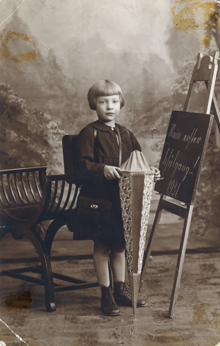 Studio portrait of Lillie Drabinawski on her first day of school.