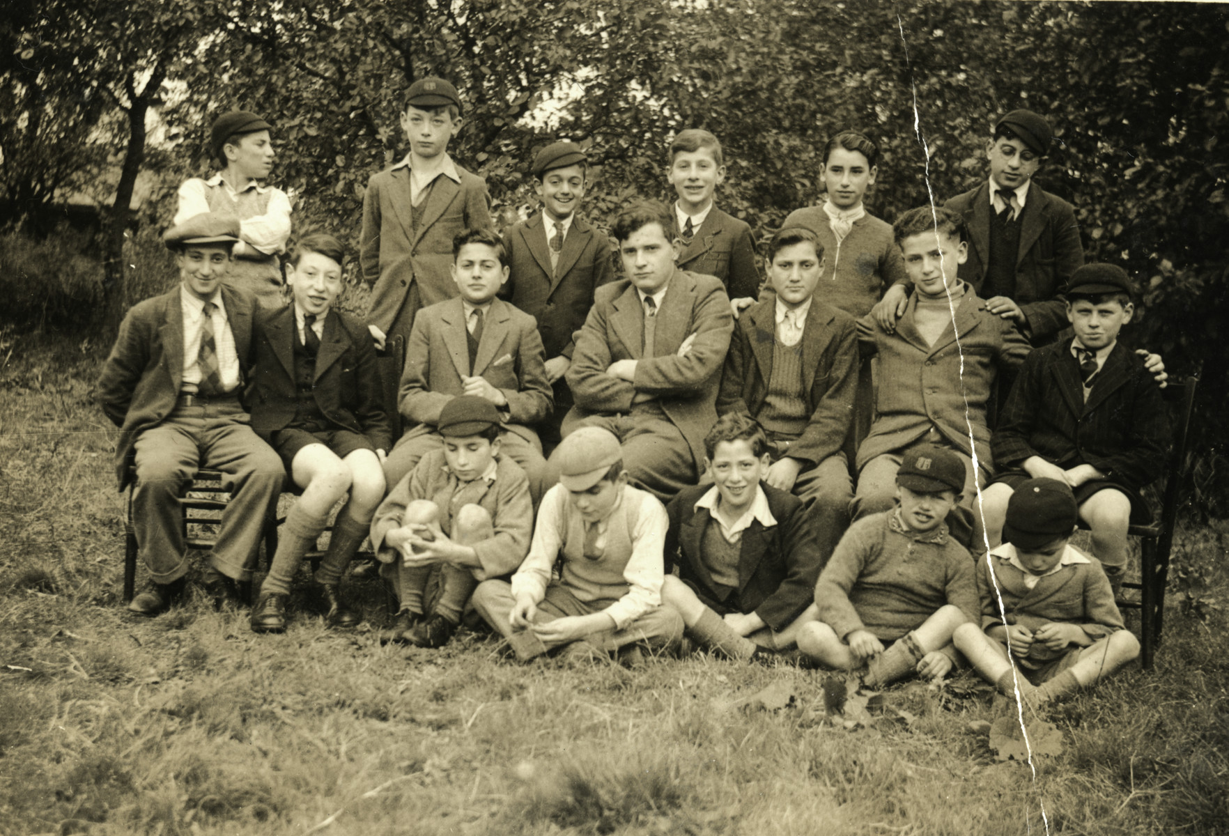 Portrait of school boys in Chase Terrace near Birmingham.

Gus Meyer who had come to England on a Kindertransport is in the middle row third from the right,