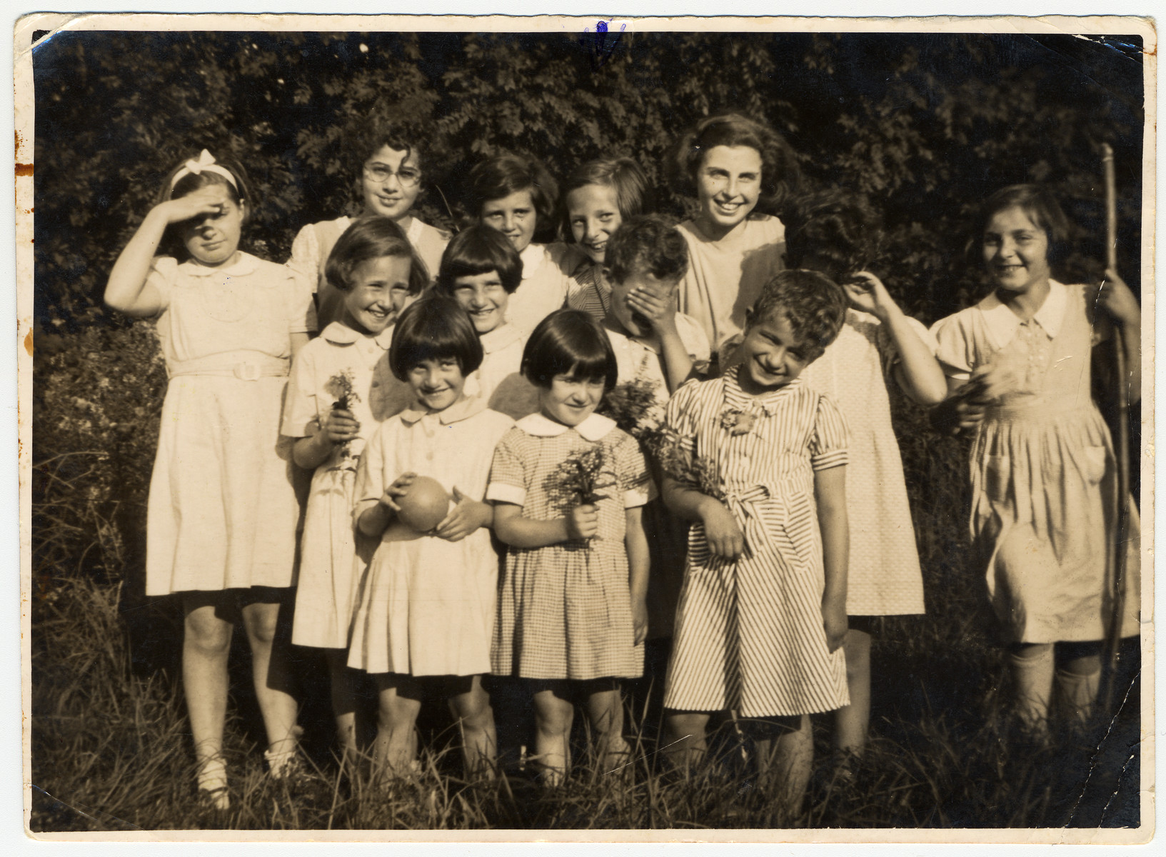 Group portrait of Jewish refugee girls who came to Great Britain on a Kindertransport.

Liesl Scherzer is pictured second from the right in the top row.