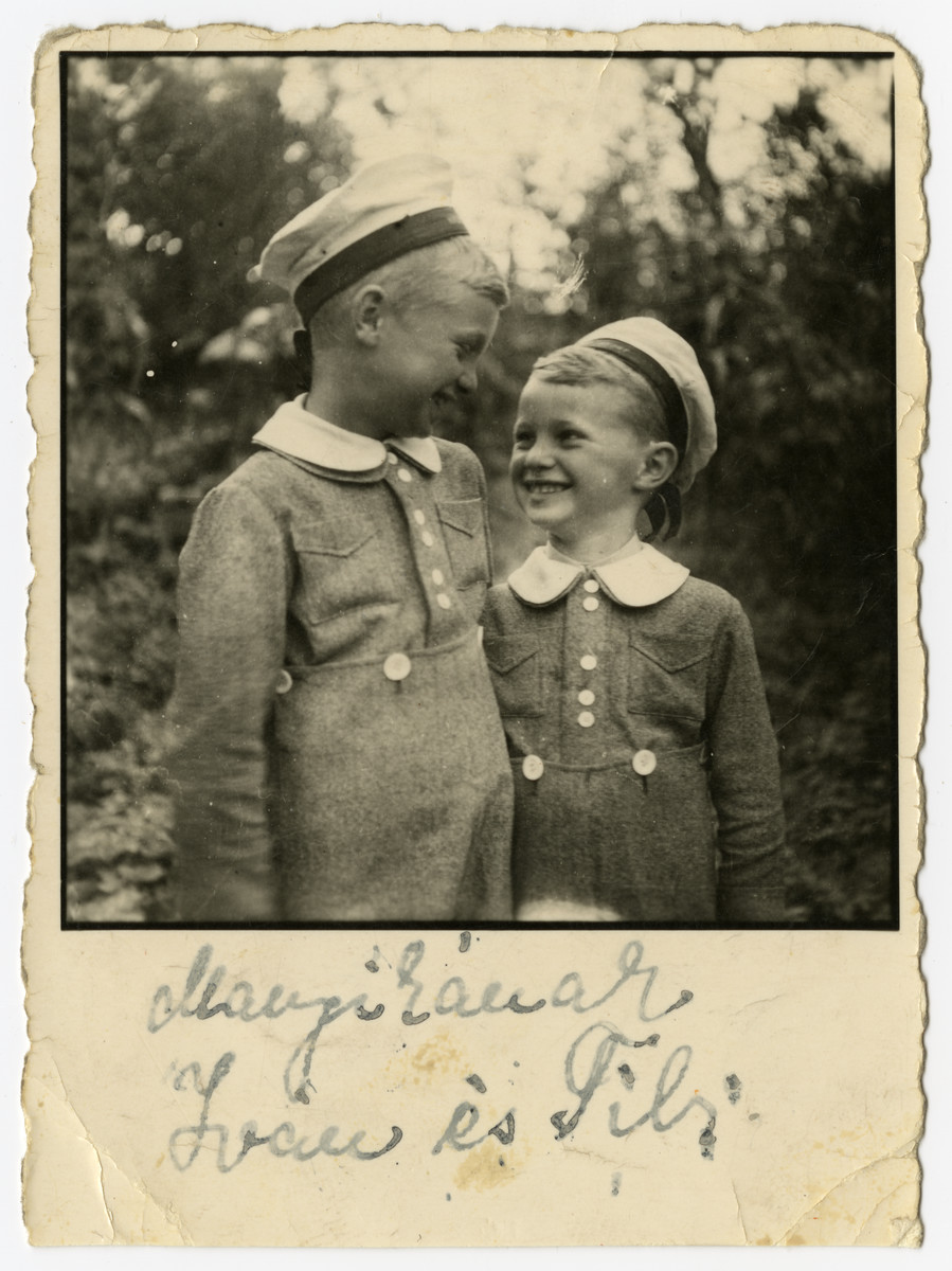 Portrait of two brothers, Ivan and Tibor, wearing matching outfits.