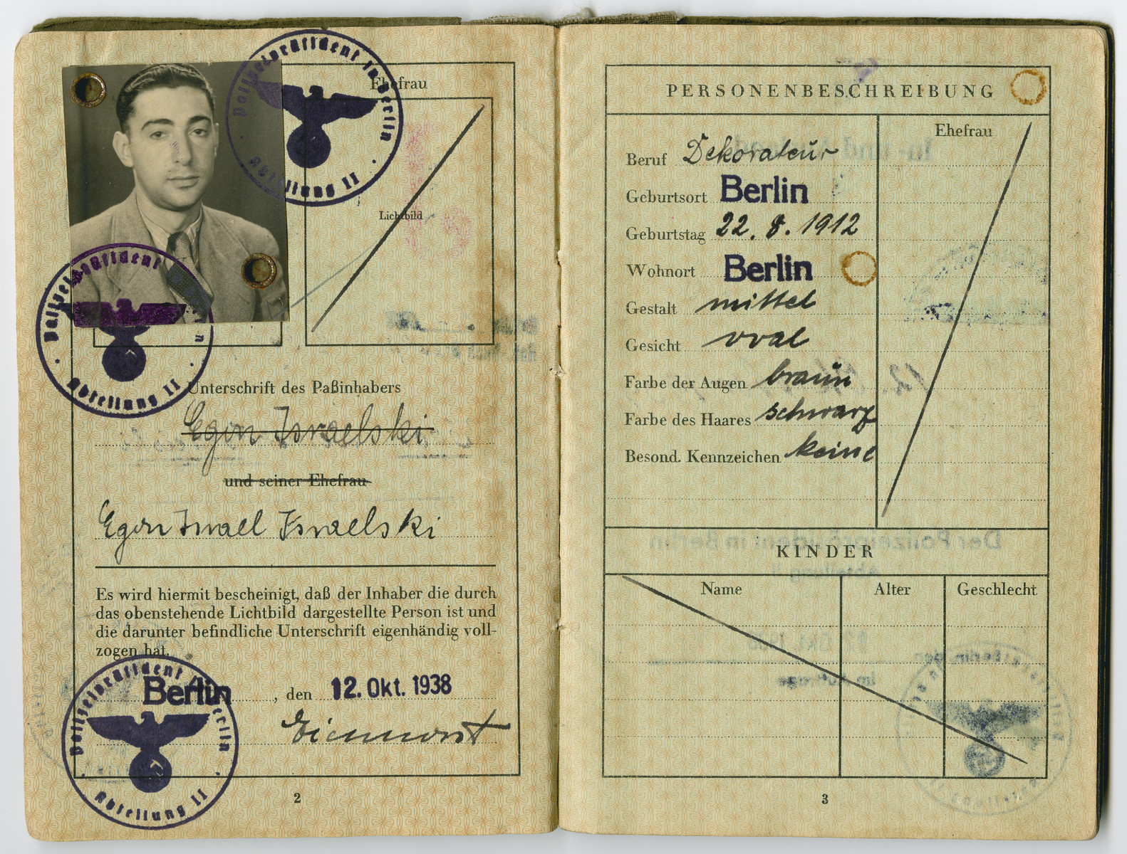 Egon Israelski's German passport showing his forced name change to include the middle name of Israel.

The Jews were not allowed to have Aryan names on their passports, so all of the boys were named Israel and the girls were Sara.