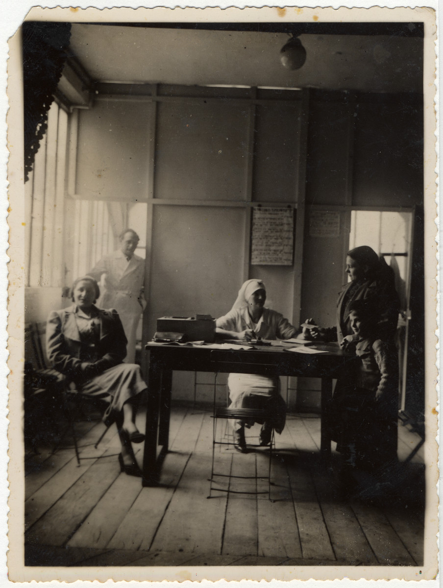 Dr. Bor (standing left) works in the Jewish clinic in Paris.  Dr. Bor was Roche Leja Gimmelstein's friend in Lithuania.
