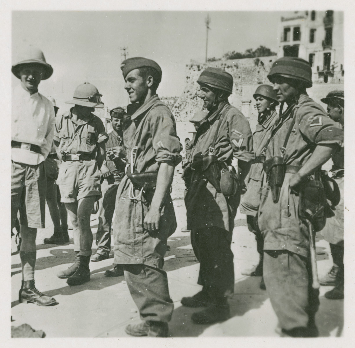 One side of a stereograph of Nazi paratroopers invading Chania, Crete.

Original caption in German reads: 
Fallschirmjäger nach der Einnahme von Chanea auf Kreta