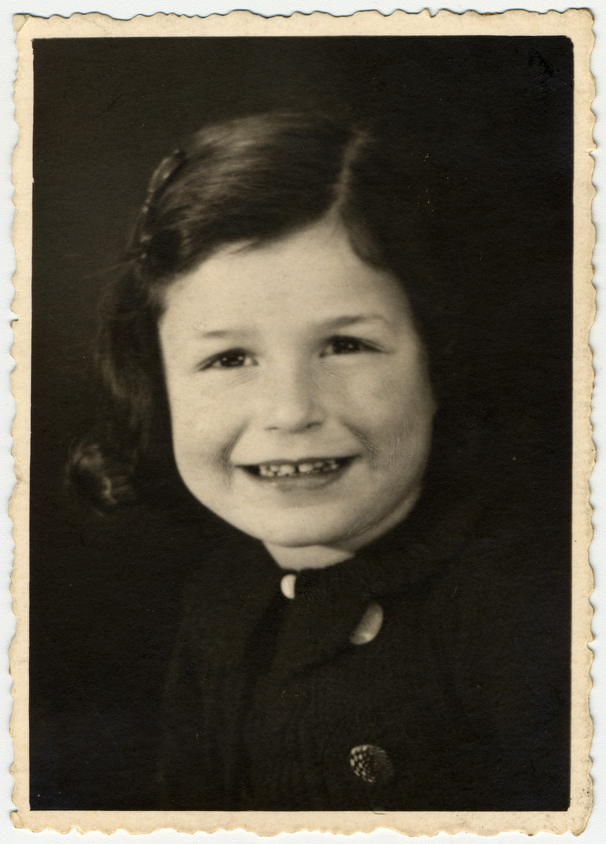 Studio portrait of six-year-old Jacqueline Mendels taken approximately one year before her family went into hiding.