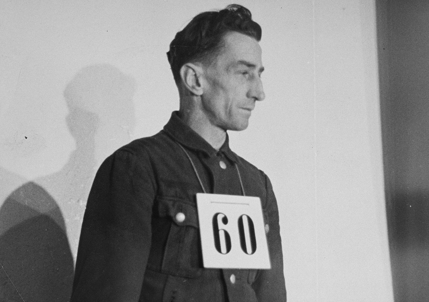 Portrait of former SS-Hauptscharfuehrer Hans Spatzenegger, a defendant at the trial of 61 former camp personnel and prisoners from Mauthausen.  

Spatzenegger was convicted and sentenced to death on May 13, 1946.