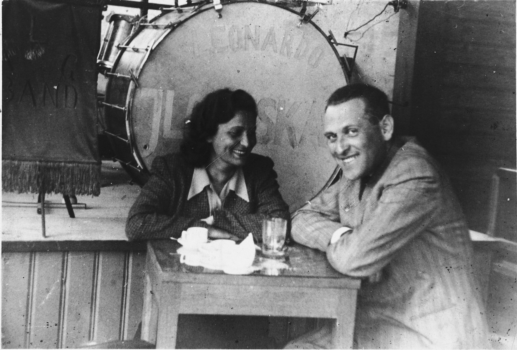 Two Jewish friends sit in a coffee house in Vilna during the Soviet occupation.

Pictured are Liza Beigel and Moshe Seligson.