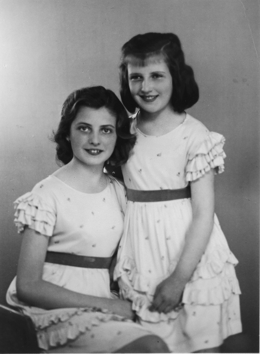 Studio portrait of two sisters, Giselle and Renee Neumann.
