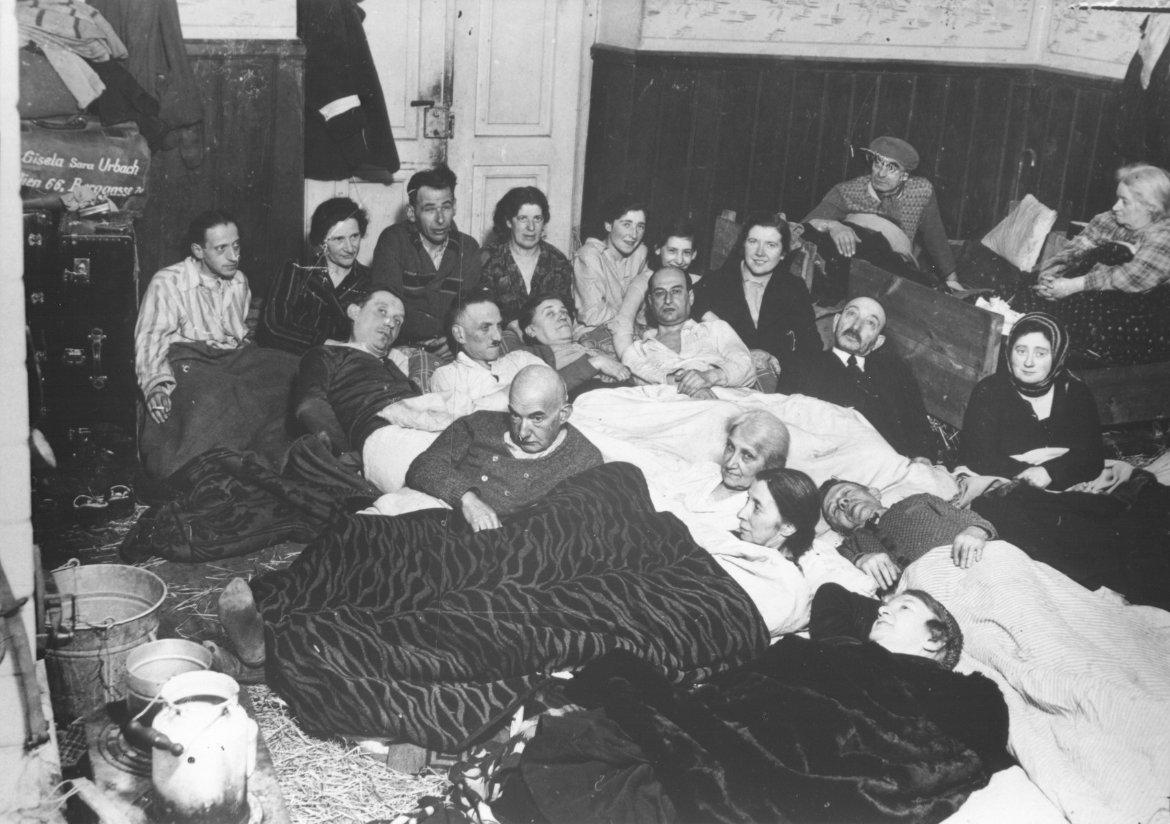 Jewish men and women from Vienna live in crowded barracks in the Opole Lubelskie ghetto.