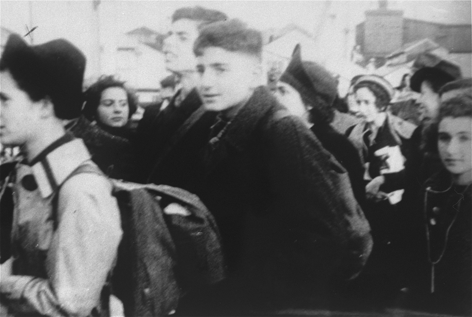 Members of the first Kindertransport arrive in Harwich, England.  

Among those pictured is the donor, Frances Rose, at the far left and Ersnt (later Ernest) Winter (center).