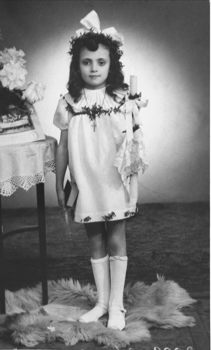 First Communion portrait of Janina Nebe, a Jewish child, who was hidden for three years by Leokadia Navrodska.