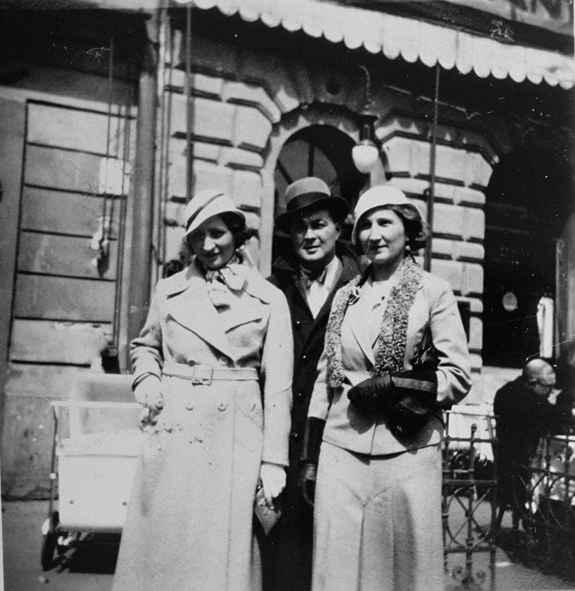Dr. Joseph Jaksy poses on a street in Bratislava with Mrs. Suran and her daughter Valeria.  

The Surans were among the 25 Jews rescued by Dr. Joseph Jaksy during WWII.  Jaksy engineered the fictitious purchase of the Suran's home in Bratislava; he provided false papers that allowed the Suran children to escape to South America; he registered the elder Surans as his own Slovak domestics; and, after a Gestapo search of the house, he provided Mrs. Suran with false papers and drove her to safety.