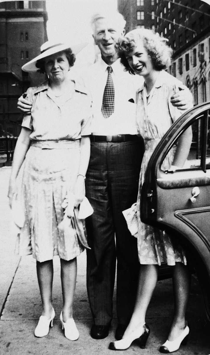 James G. McDonald poses with his wife, Ruth, and daughter Janet on a street in Washington, D.C.