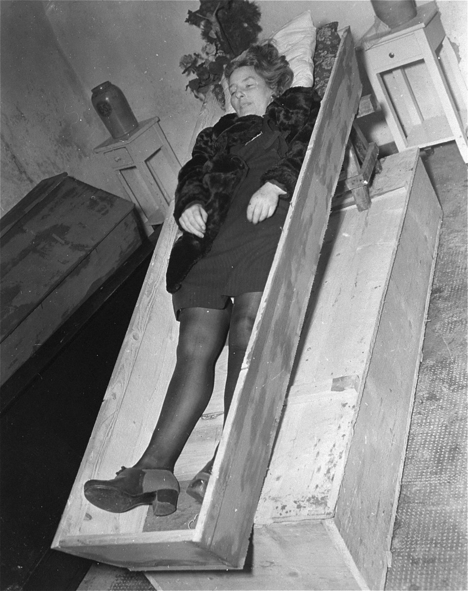 The corpse of a woman lies in an open coffin at the Hadamar Institute where she was put to death as part of the Operation T4 euthanasia program.

The photograph was taken by an American military photographer soon after the liberation.