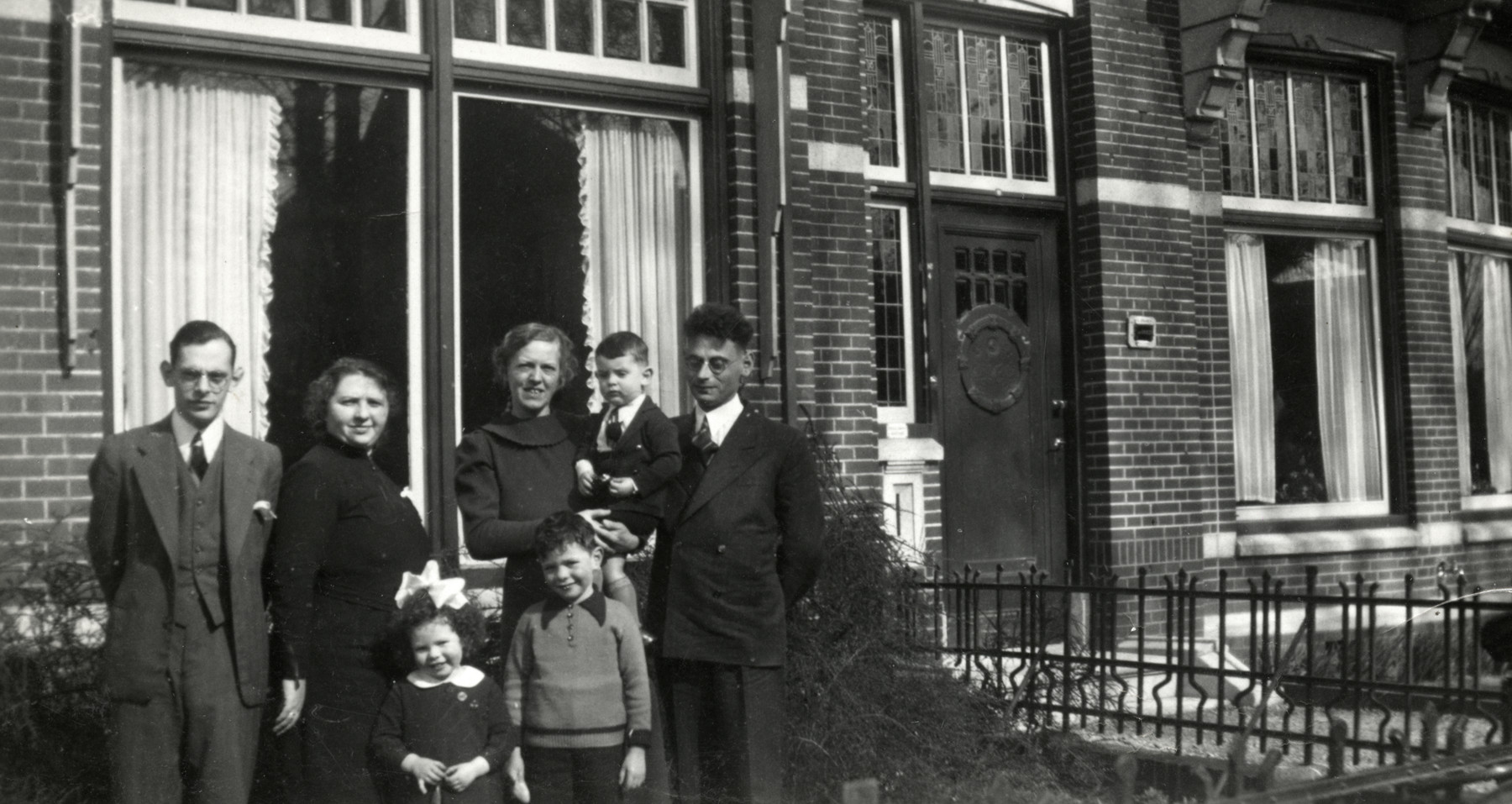 The Drukker family poses outside its home in Winschoten.

Pictured in front are Elly and Alfred Drukker.  Behind them from lef tto right are unidentified, Erna Drukker,  Stein holding a child and Maurits Drukker.