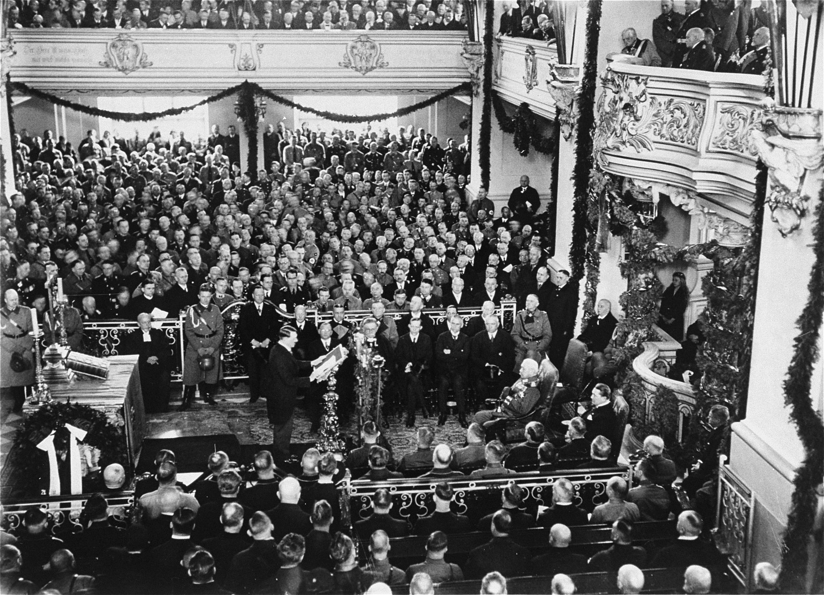 Hitler delivers his first address at the opening of the new Reichstag in Potsdam.