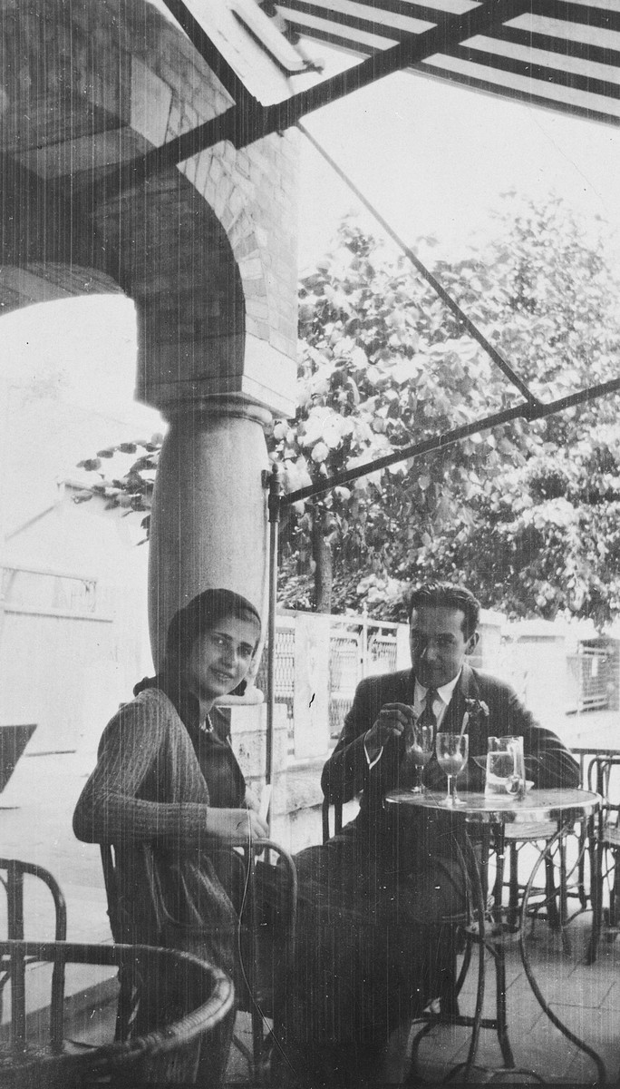 Students from the Institute of Art in Brussels enjoy a drink on an outdoor terrace.

Pictured are Esther Lurie and her friend Jose.