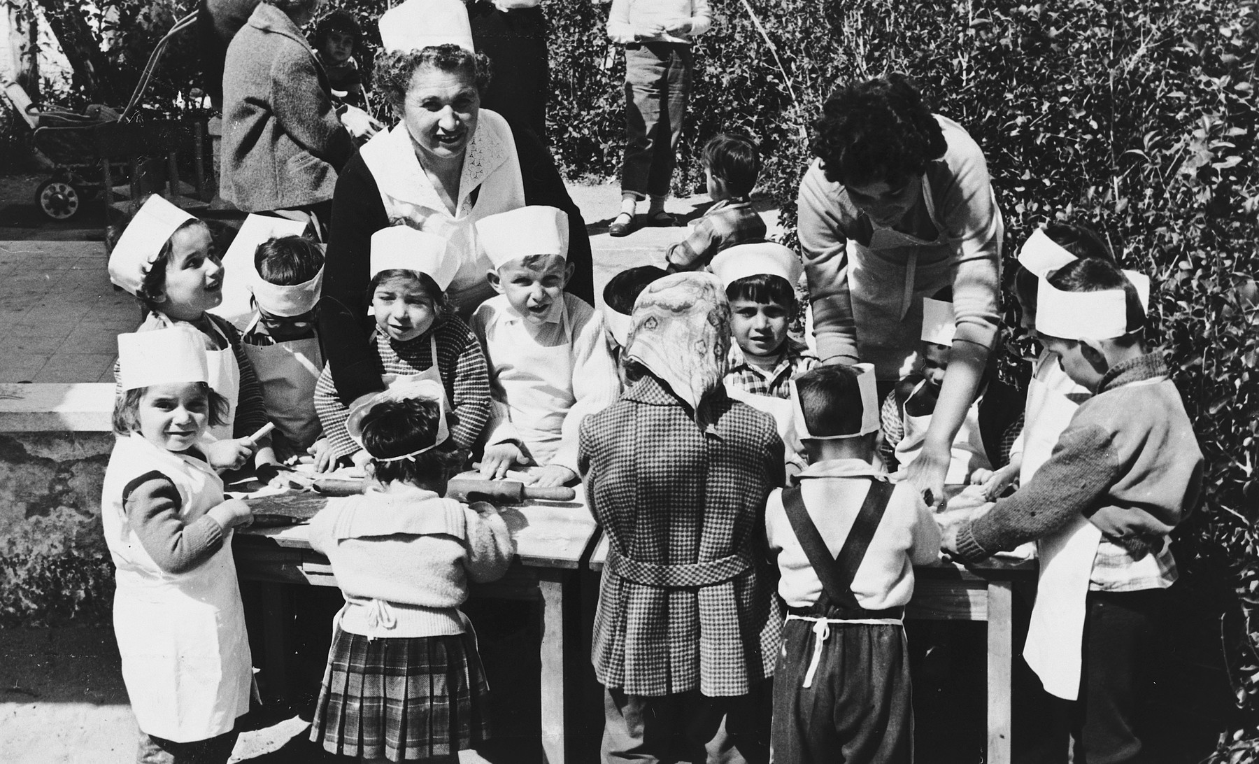 Children in an Austrian-Jewish preschool learn to cook.