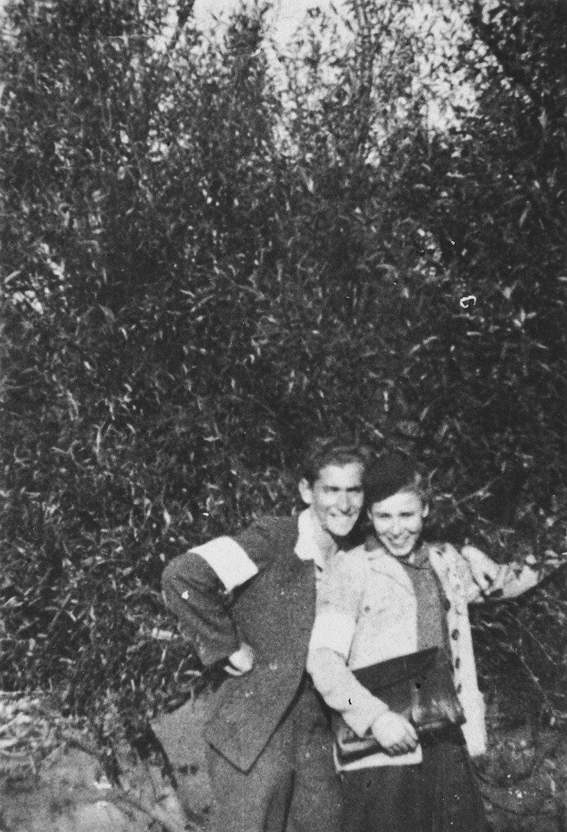 Close-up portrait of Bela Milstein and Jacob Gutman wearing armbands in the Radom ghetto.