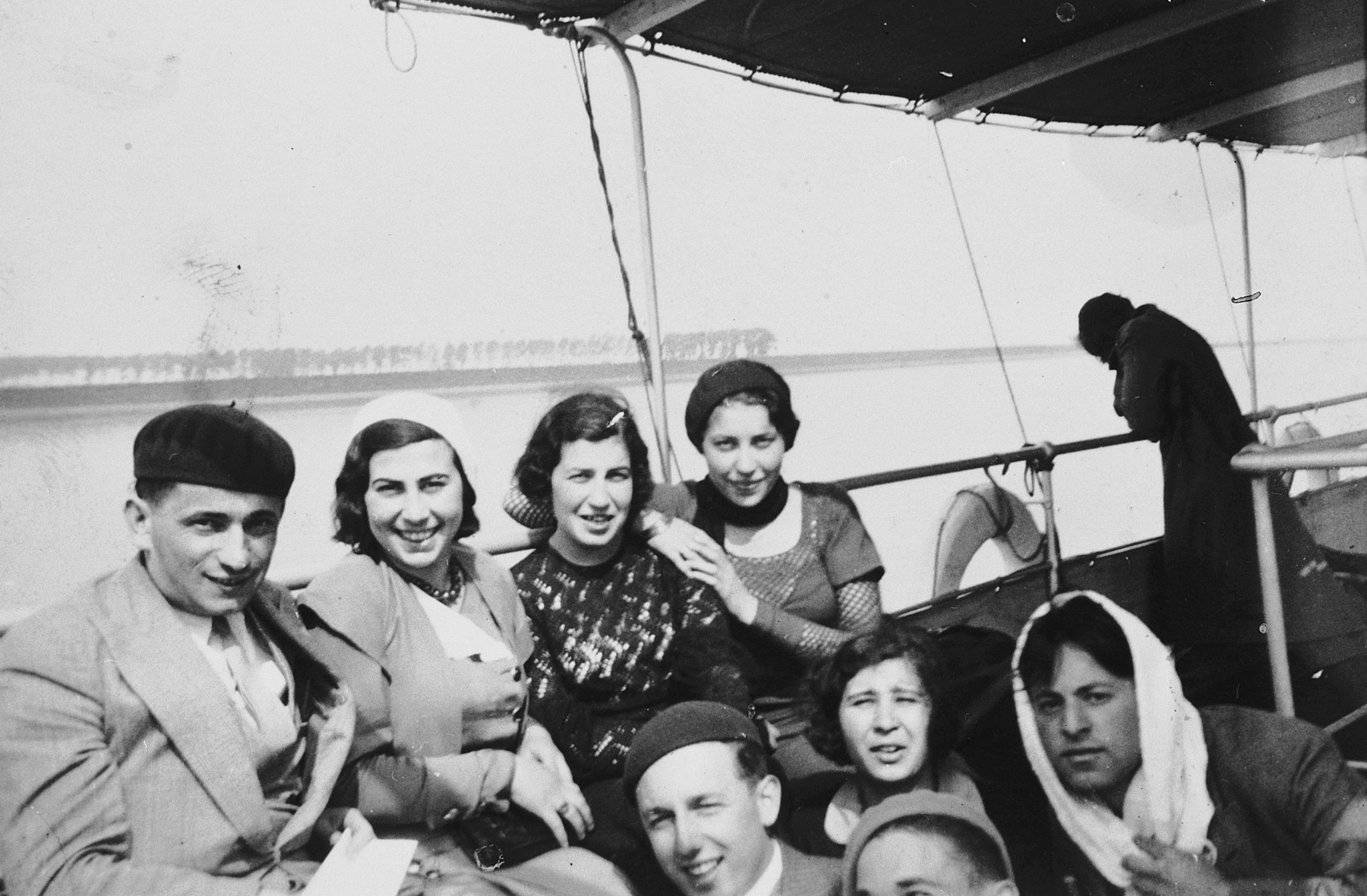 [Students from the Institute of Art in Brussels] enjoy an excursion on a pleasure boat.

Among those pictured are Esther Lurie.