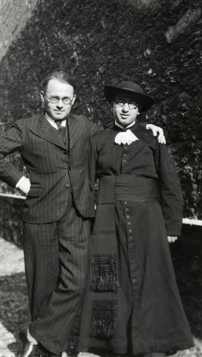Rabbi Moise Cassorla (father of the donor, on right) poses in full rabbinical attire with an unknown person in a suit.