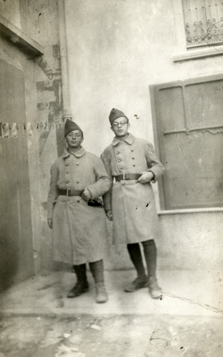 Close-up portrait of two members of the Engage Volontaires, foreign-born Jews in a French paramilitary unit.

Mendel Max Rosensweig is pictured on the left.