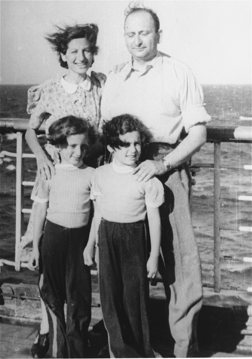 Fritz and Babette Spanier stand at the rail of the MS St. Louis with their twin daughters, Renate and Ines.

Photograph from the personal St. Louis album assembled by the donor's mother, Lotte Altschul.