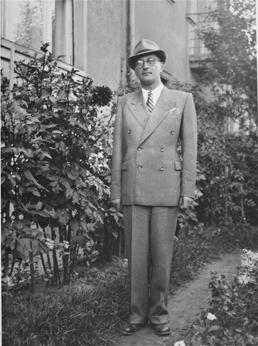 Istvan Pick poses in front of his parents home located at Dorozsmai Street 26, Budapest XIV.