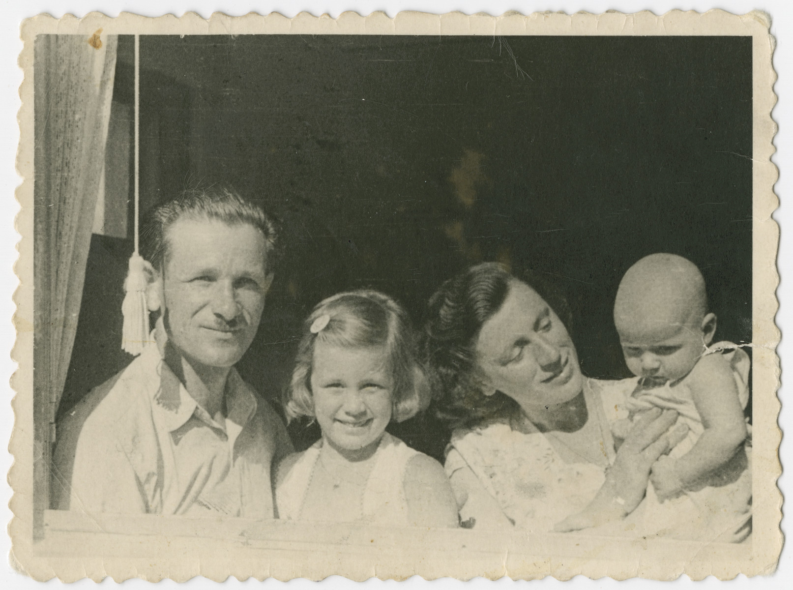 The family of Yehuda Bielski looks out the window of their home in Israel.

From left to right are Yehuda, Nili, Lola and Yigal Bielski.