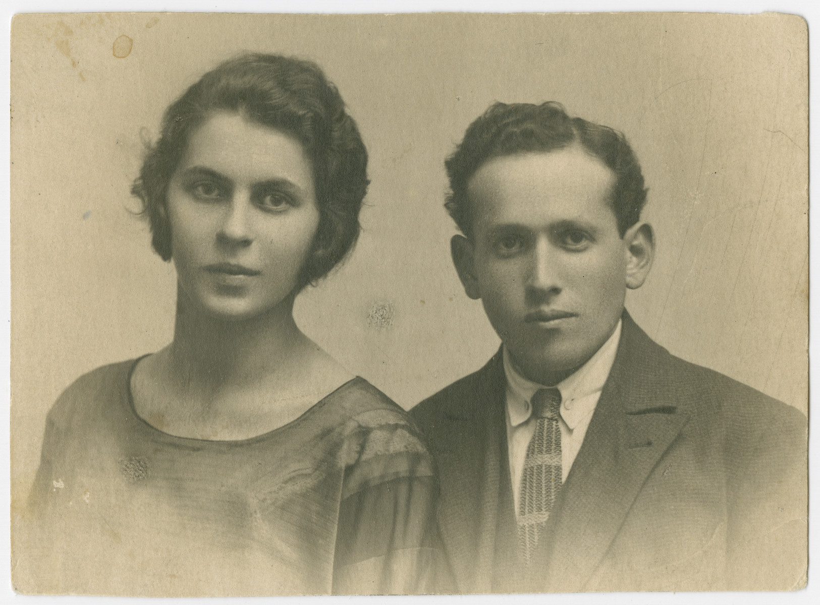 Studio portrait of Eva Hudes Fishman (sister of  Lola Hudes Bielski) and her husband, Lazar Fishman.  They and their three children all perished in Majdanek.