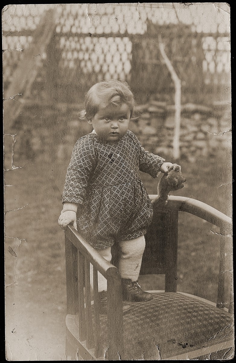 Ruth Wottitzky stands on a chair in the yard of her home in Windigsteig, Austria.