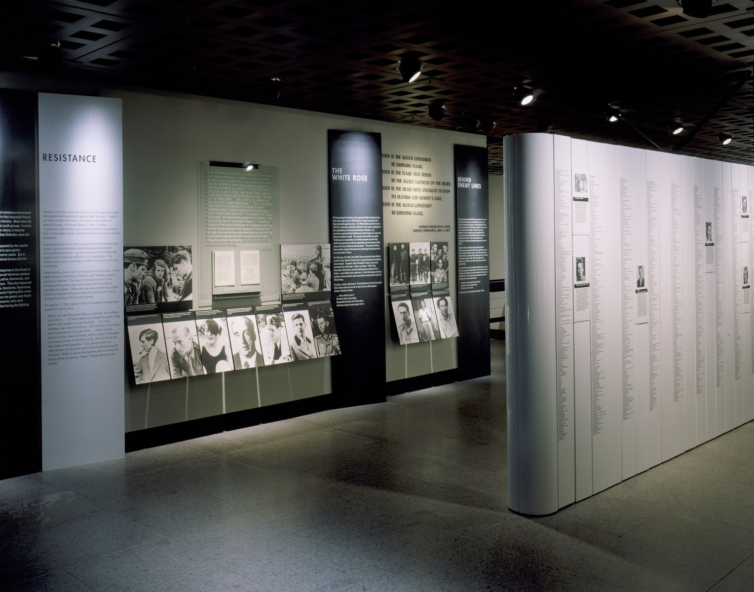 View of the Resistance segment on the second floor of the permanent exhibition at the U.S. Holocaust Memorial Museum, including the "White Rose" and "Behind Enemy Lines" panels and one side of the "Rescuers Wall".