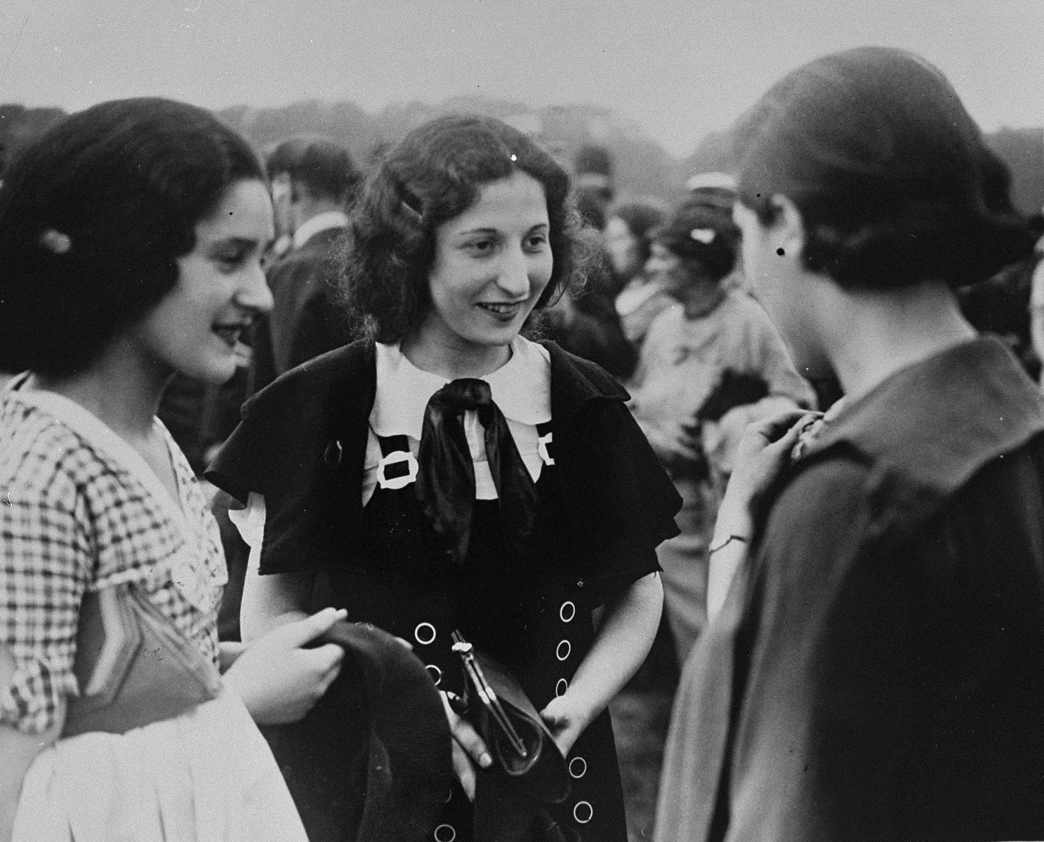 Three young Jewish women converse at a mass demonstration in Hyde Park to protest against the Nazi persecution of German Jewry.
