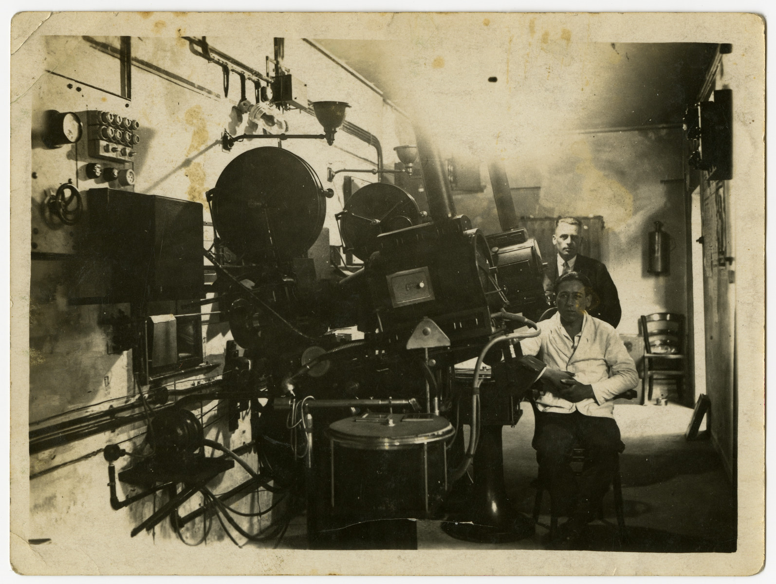 Projection studio of the Rheingold Theater, attatched to the Cohn's home.  

The Nazis later confiscated the theater, and the young  German man pictured in the photograph assumed control.