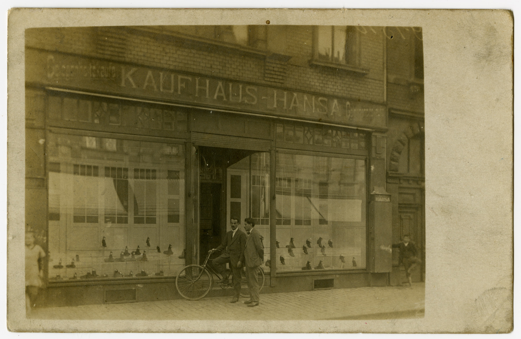 Marcus Cohn stands outside his father's shoe store in Ludwigshafen.