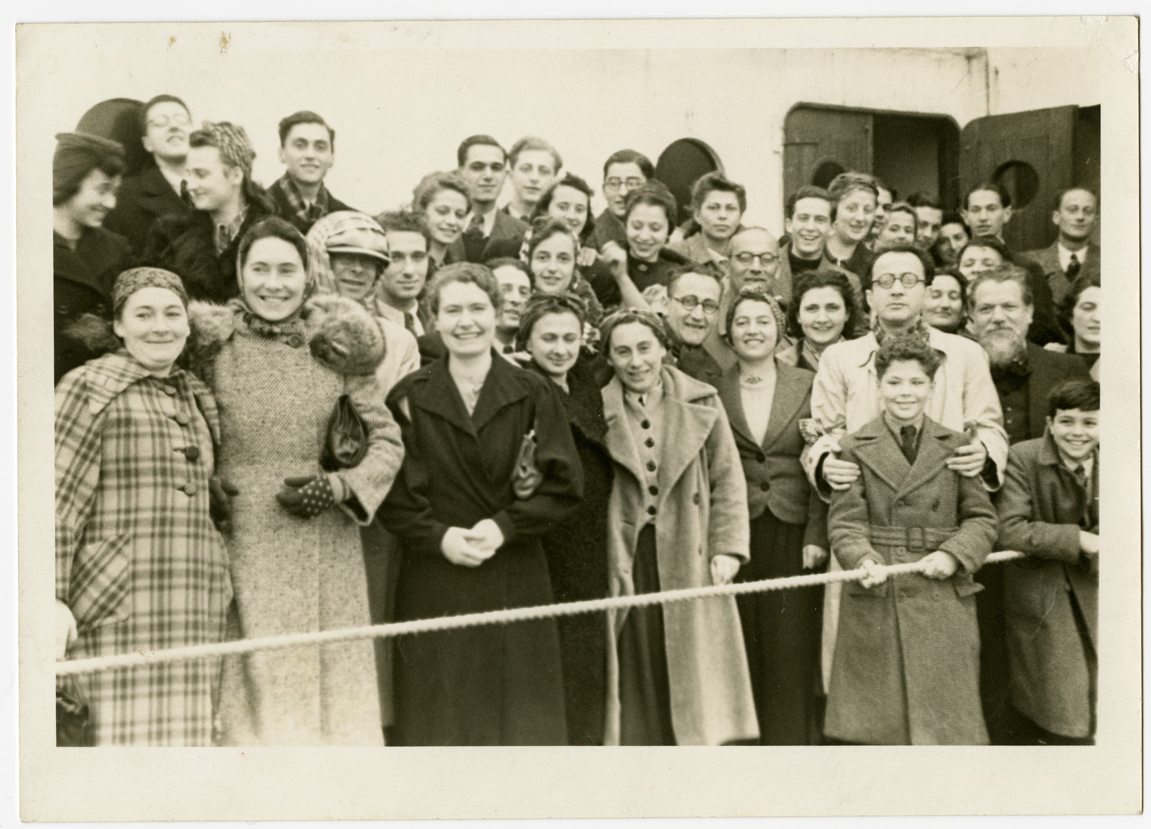 Group portrait of German Jews en route to the United States on board the President Harding.
