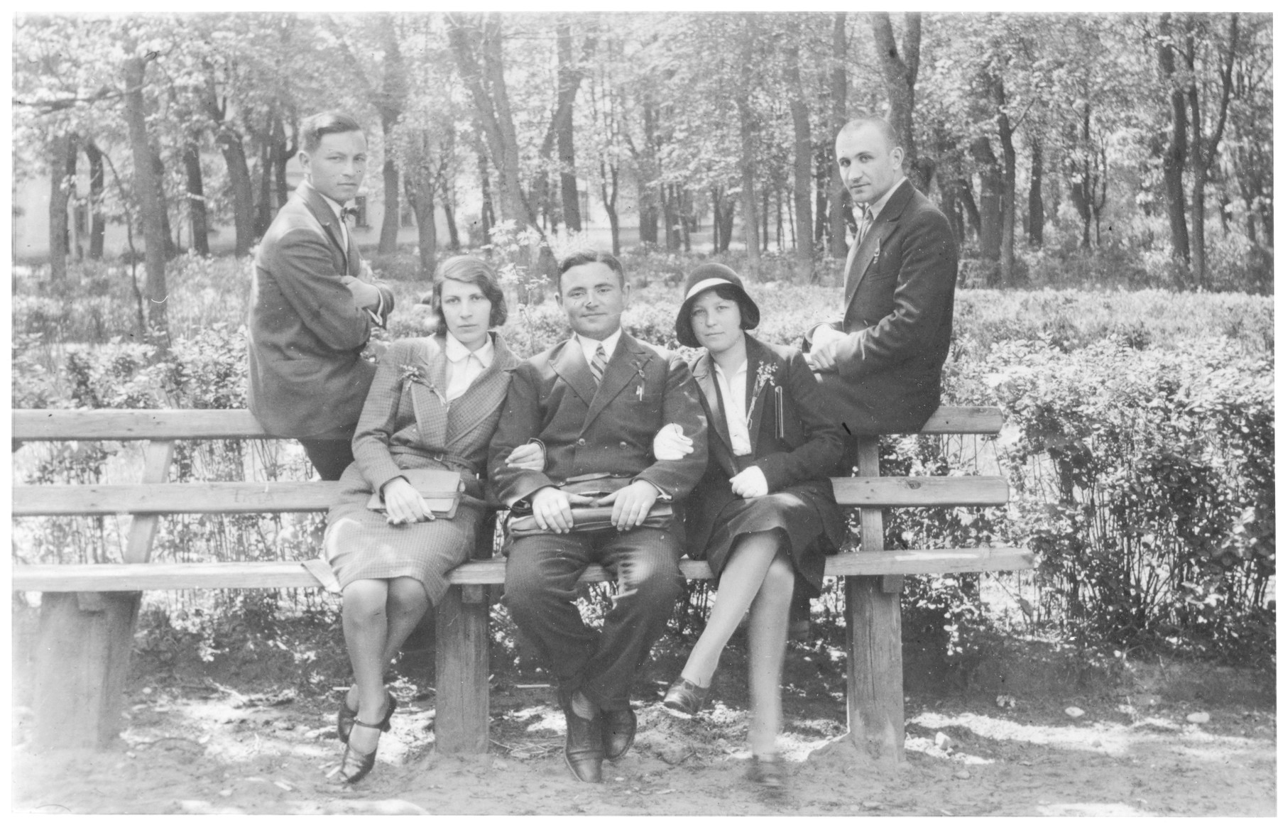 Jewish students pose on a bench at the University of Vilna.

Seated from left to right are: Rusia and her brother Abrasha Knyszynsky, Raya Markon and Max Heller (behind on the right).