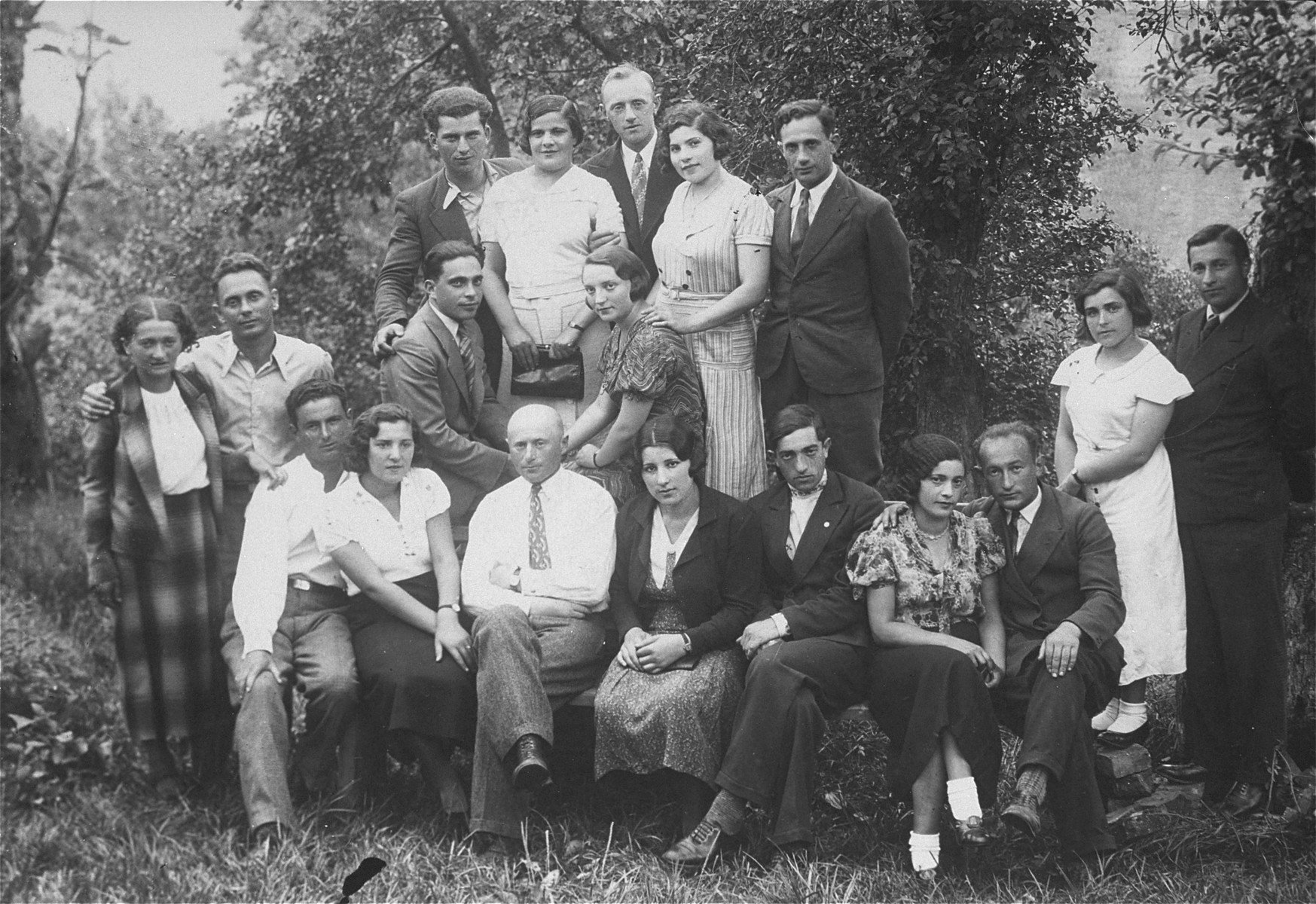 Group portrait of young Jewish men and women involved in the Zionist movement in Lithuania.

Eliezer Kaplan is pictured sitting in the front row, third from the right.