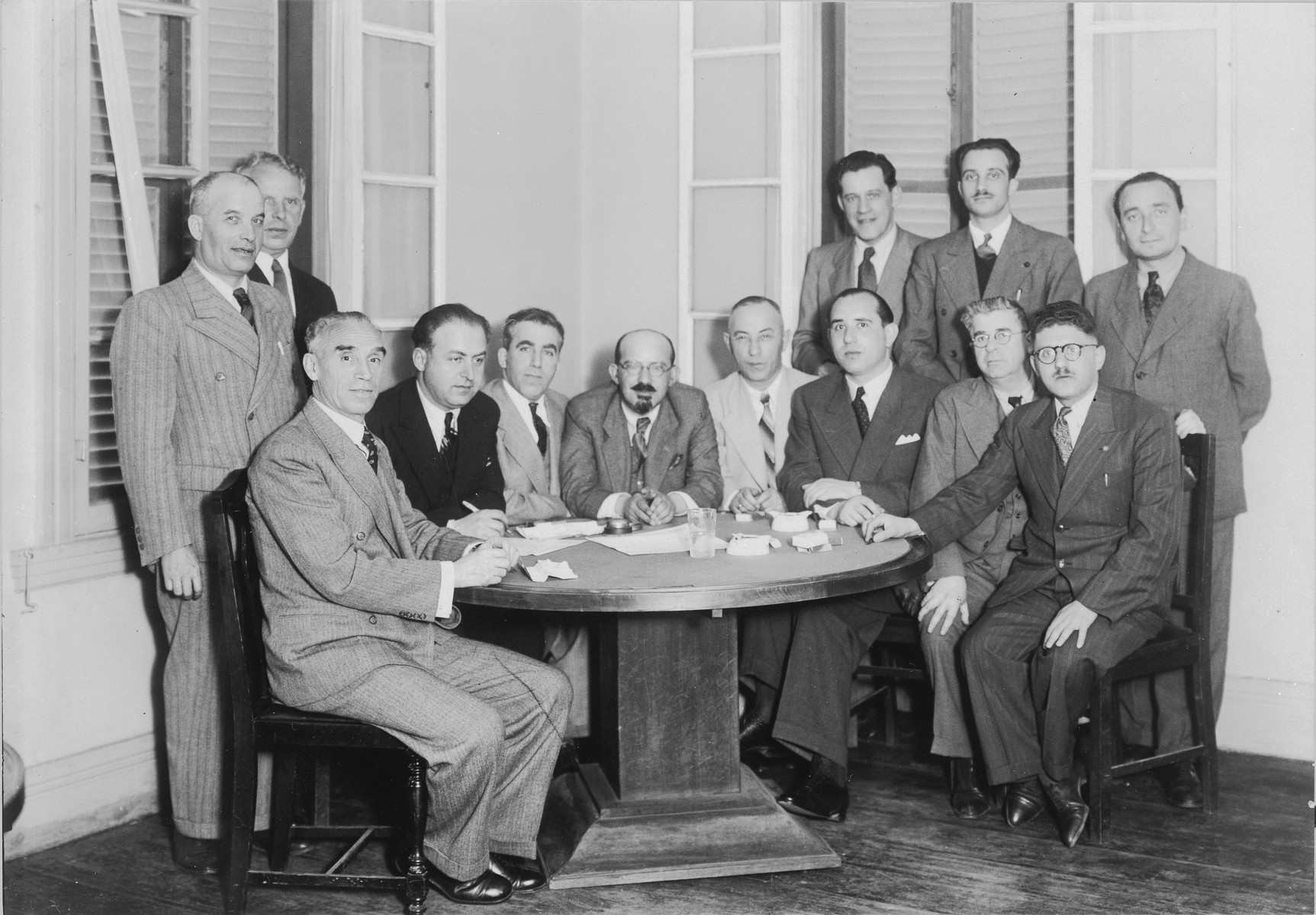 Group photograph of the leadership of the Kobe Jewish community.

Among those pictured are Anatole Ponevejsky (seated third from the left), Moise Moiseeff (fourth from the left), Anatole Ponve (fifth from the left), and Solomon Stolowy (standing, far left).